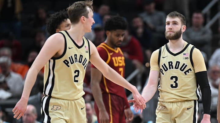 Purdue guards Fletcher Loyer (2) and Braden Smith (3) slap hands during the Big Ten Tournament in Indianapolis last week. Purdue guards Fletcher Loyer (2) and Braden Smith (3) slap hands during the Big Ten Tournament in Indianapolis last week.