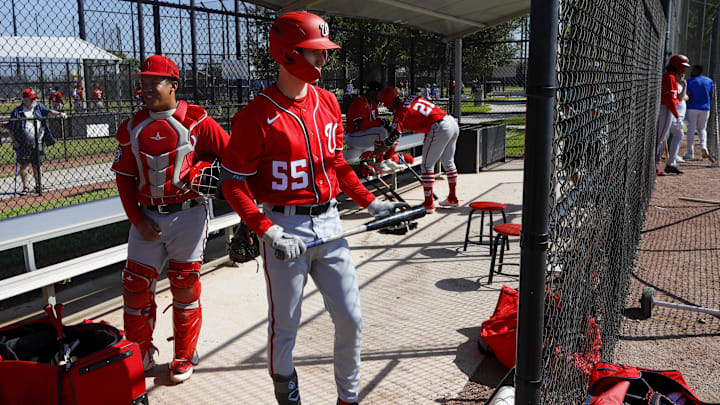 Feb 20, 2023; West Palm Beach, FL, USA; Washington Nationals outfielder Robert Hassell III (55) looks on prior to taking batting practice during a spring training workout at The Ballpark of the Palm Beaches.