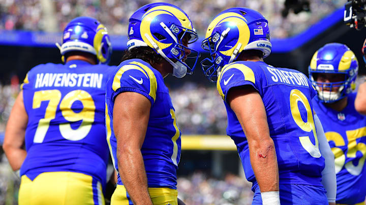 Oct 8, 2023; Inglewood, California, USA; Los Angeles Rams wide receiver Puka Nacua (17) celebrates his touchdown scored against the Philadelphia Eagles with quarterback Matthew Stafford (9) during the first half at SoFi Stadium. Mandatory Credit: Gary A. Vasquez-Imagn Images