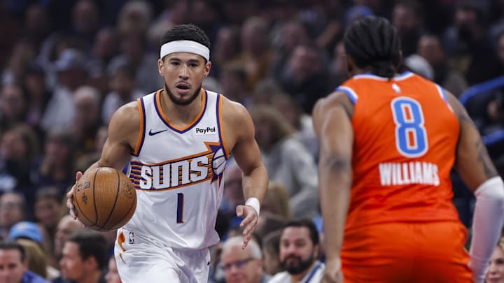 Nov 28, 2025; Oklahoma City, Oklahoma, USA;Phoenix Suns guard Devin Booker (1) dribbles down the court against the Oklahoma City Thunder during the first quarter at Paycom Center. Mandatory Credit: Alonzo Adams-Imagn Images Nov 28, 2025; Oklahoma City, Oklahoma, USA;Phoenix Suns guard Devin Booker (1) dribbles down the court against the Oklahoma City Thunder during the first quarter at Paycom Center. Mandatory Credit: Alonzo Adams-Imagn Images