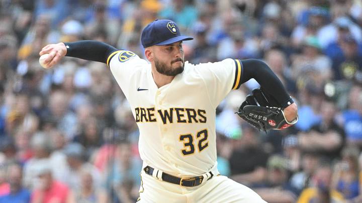 Jun 21, 2023; Milwaukee, Wisconsin, USA; Milwaukee Brewers relief pitcher Peter Strzelecki (32) delivers a pitch against the Arizona Diamondbacks in the seventh inning at American Family Field. Mandatory Credit: Michael McLoone-Imagn Images