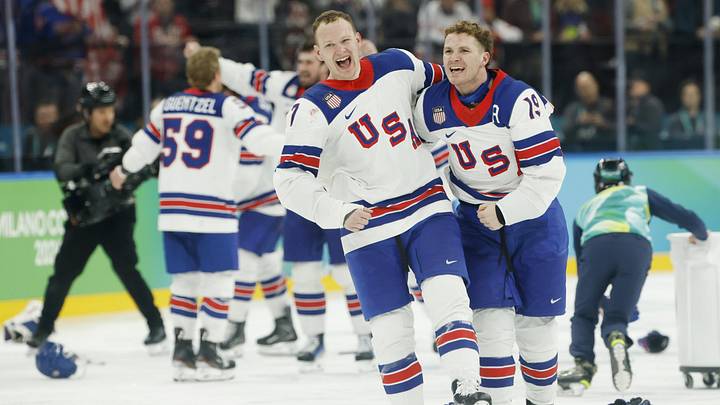 Feb 22, 2026; Milan, Italy; Matthew Tkachuk (19) of the United States and Brady Tkachuk (7) of the United States celebrate after defeating Canada  in the men's ice hockey gold medal game during the Milano Cortina 2026 Olympic Winter Games at Milano Santagiulia Ice Hockey Arena. Mandatory Credit: Geoff Burke-Imagn Images