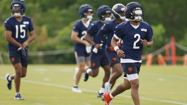 Jul 24, 2025; Lake Forest, IL, USA; Chicago Bears wide receiver DJ Moore (2) runs on the field during training camp at Halas Hall. Mandatory Credit: Kamil Krzaczynski-Imagn Images