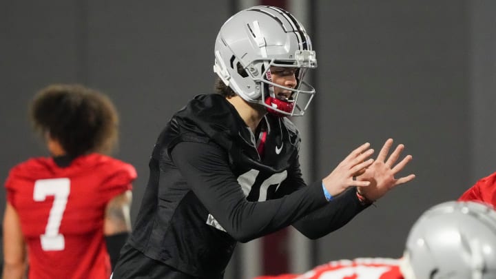Mar 7, 2024; Columbus, OH, USA; Ohio State Buckeyes quarterback Julian Sayin (10) takes a snap during spring football practice at the Woody Hayes Athletic Center.
