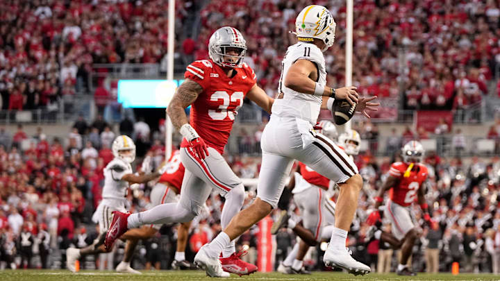Sep 7, 2024; Columbus, Ohio, USA; Ohio State Buckeyes defensive end Jack Sawyer (33) pursues Western Michigan Broncos quarterback Hayden Wolff (11) during the first half of the NCAA football game at Ohio Stadium.