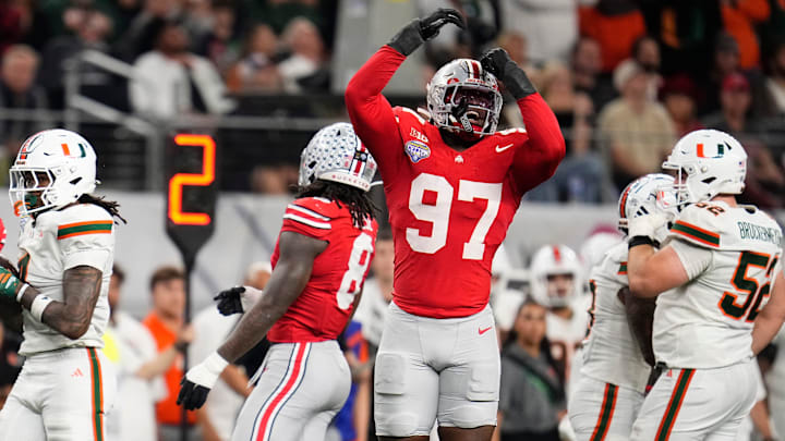 Ohio State Buckeyes defensive end Kenyatta Jackson Jr. (97) reacts during the Cotton Bowl in Arlington, Texas for the College Football Playoff quarterfinal game against the Miami Hurricanes on Dec. 31, 2025. Ohio State lost 24-14.