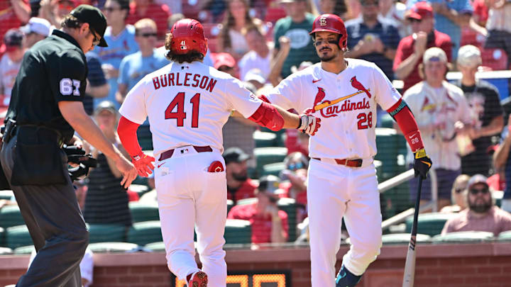 Sep 17, 2025; St. Louis, Missouri, USA; St. Louis Cardinals first baseman Alec Burleson (41) is congratulated at home plate by St. Louis Cardinals third baseman Nolan Arenado (28) after he hit a home run against the Cincinnati Reds in the first inning at Busch Stadium. Mandatory Credit: Tim Vizer-Imagn Images Sep 17, 2025; St. Louis, Missouri, USA; St. Louis Cardinals first baseman Alec Burleson (41) is congratulated at home plate by St. Louis Cardinals third baseman Nolan Arenado (28) after he hit a home run against the Cincinnati Reds in the first inning at Busch Stadium. Mandatory Credit: Tim Vizer-Imagn Images