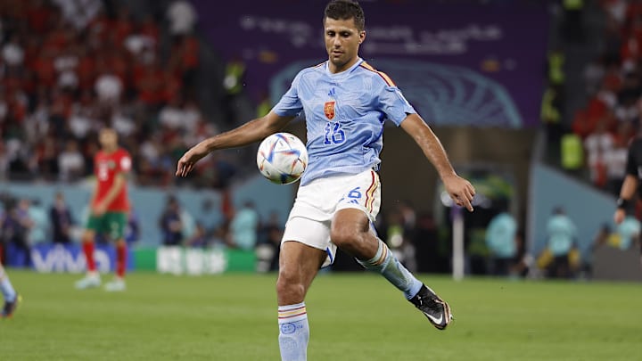 Dec 6, 2022; Ar Rayyan, QATAR; Spain midfielder Rodri (16) controls the ball against Morocco during the second half in the round of sixteen match of the 2022 FIFA World Cup at Education City Stadium. Mandatory Credit: Yukihito Taguchi-Imagn Images