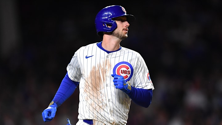 May 27, 2025; Chicago, Illinois, USA; Chicago Cubs right fielder Kyle Tucker (30) runs after hitting a single during the seventh inning against the Colorado Rockies at Wrigley Field. Mandatory Credit: Patrick Gorski-Imagn Images
