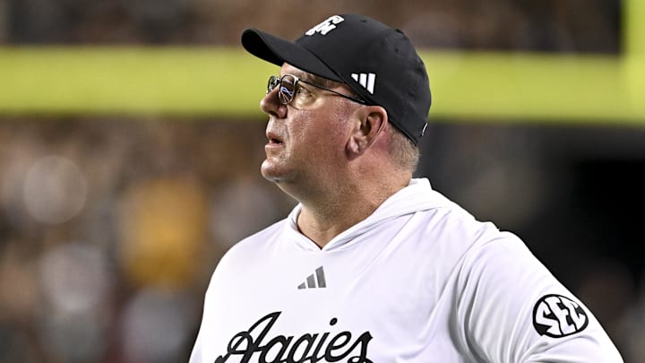 Oct 26, 2024; College Station, Texas, USA; Texas A&M Aggies head coach Mike Elko watches the replay in the third quarter against the LSU Tigers at Kyle Field. Oct 26, 2024; College Station, Texas, USA; Texas A&M Aggies head coach Mike Elko watches the replay in the third quarter against the LSU Tigers at Kyle Field.