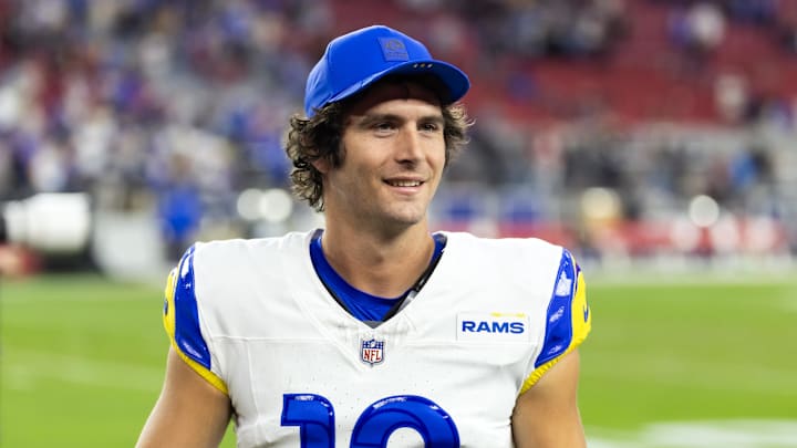 Dec 7, 2025; Glendale, Arizona, USA; Los Angeles Rams quarterback Stetson Bennett IV (13) against the Arizona Cardinals at State Farm Stadium. Mandatory Credit: Mark J. Rebilas-Imagn Images