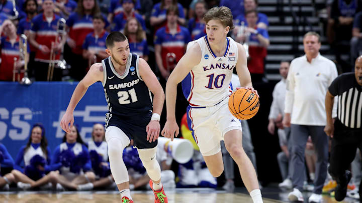 Mar 21, 2024; Salt Lake City, UT, USA; Kansas Jayhawks guard Johnny Furphy (10) dribbles the ball