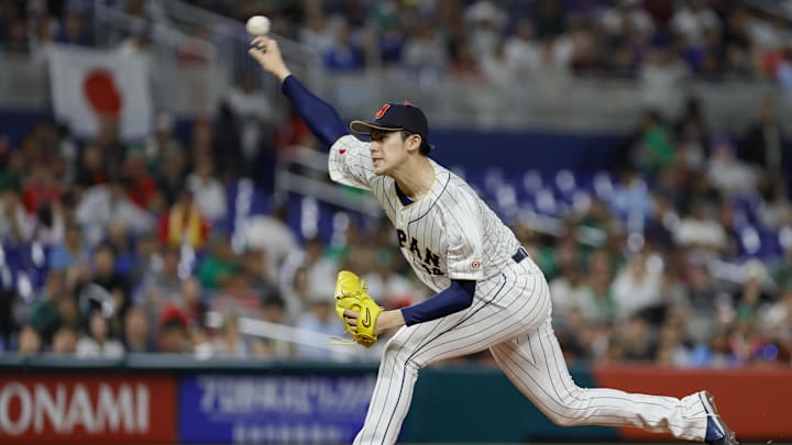 Mar 20, 2023; Miami, Florida, USA; Japan starting pitcher Roki Sasaki (14) delivers a pitch during the first inning against Mexico at LoanDepot Park. Mar 20, 2023; Miami, Florida, USA; Japan starting pitcher Roki Sasaki (14) delivers a pitch during the first inning against Mexico at LoanDepot Park.