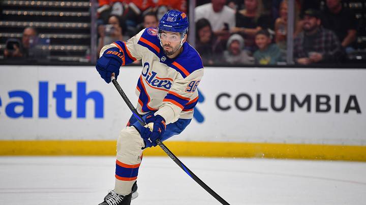 Oct 7, 2026; Anaheim, California, USA; Edmonton Oilers defenseman Jake Walman (96) mvoes the puck against the Anaheim Ducks during the first period at Honda Center. Mandatory Credit: Gary A. Vasquez-Imagn Images Oct 7, 2026; Anaheim, California, USA; Edmonton Oilers defenseman Jake Walman (96) mvoes the puck against the Anaheim Ducks during the first period at Honda Center. Mandatory Credit: Gary A. Vasquez-Imagn Images