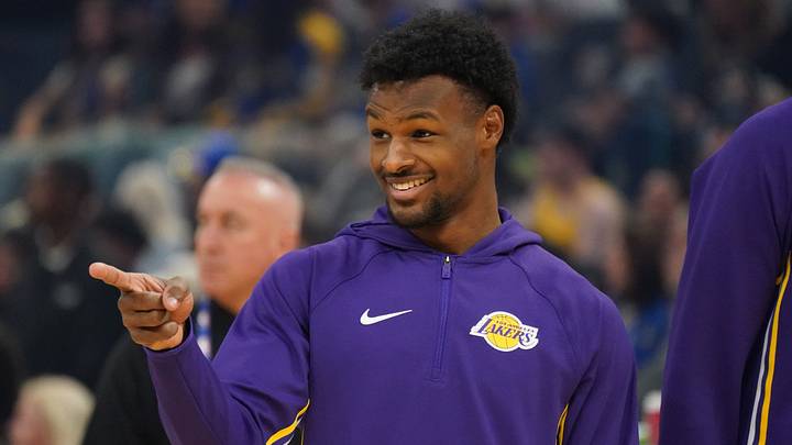 Oct 5, 2025; San Francisco, California, USA;   Los Angeles Lakers guard Bronny James (9) smiles at a teammate during warms up before the game against the Golden State Warriors at Chase Center. Mandatory Credit: David Gonzales-Imagn Images