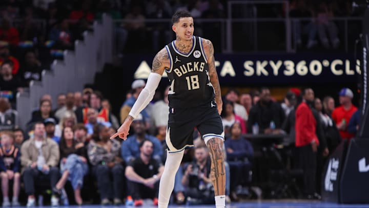 Feb 7, 2025; Atlanta, Georgia, USA; Milwaukee Bucks forward Kyle Kuzma (18) reacts after a basket against the Atlanta Hawks in the second quarter at State Farm Arena. Mandatory Credit: Brett Davis-Imagn Images