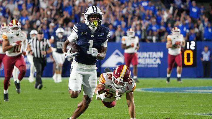 BYU wide receiver Legend Glasker runs for a touchdown while being defended by Iowa State safety Brody Miller. The No. 8 Cougars host No. 2 Notre Dame this week. BYU wide receiver Legend Glasker runs for a touchdown while being defended by Iowa State safety Brody Miller. The No. 8 Cougars host No. 2 Notre Dame this week.