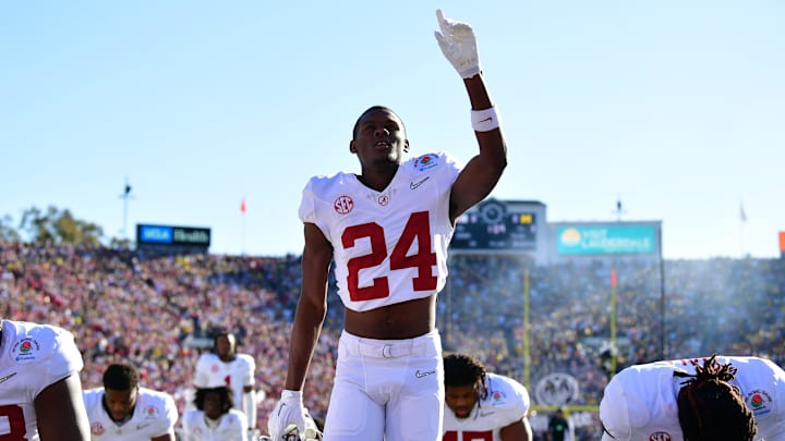 Jan 1, 2024; Pasadena, CA, USA; Alabama Crimson Tide wide receiver Emmanuel Henderson Jr. (24) prays with teammates in the endzone before the 2024 Rose Bowl college football playoff semifinal game against the Michigan Wolverines at Rose Bowl. Mandatory Credit: Gary A. Vasquez-Imagn Images