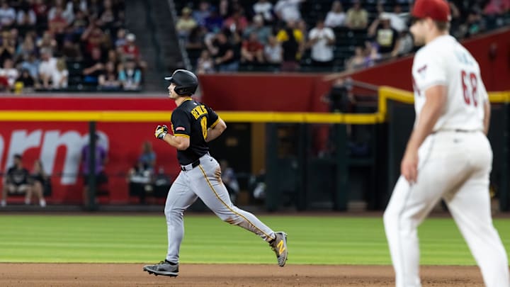 Phoenix, Arizona, USA; Pittsburgh Pirates right fielder Bryan Reynolds rounds the bases after hitting a three-run home run in the eighth inning against the Arizona Diamondbacks at Chase Field.
