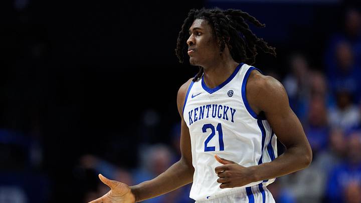 Kentucky Wildcats forward Jayden Quaintance (21) fives a teammate Kentucky Wildcats forward Jayden Quaintance (21) fives a teammate