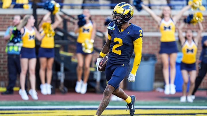 JACKSONVILLE JAGUARS: Michigan defensive back Will Johnson celebrates a touchdown after intercepting USC quarterback Miller Moss during the second half at Michigan Stadium in Ann Arbor on Saturday, Sept. 21, 2024.