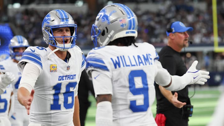 Oct 13, 2024; Arlington, Texas, USA; Detroit Lions wide receiver Jameson Williams (9) celebrates with Detroit Lions quarterback Jared Goff (16) after catching a touchdown pass during the second half against the Dallas Cowboys at AT&T Stadium. Mandatory Credit: Kevin Jairaj-Imagn Images Oct 13, 2024; Arlington, Texas, USA; Detroit Lions wide receiver Jameson Williams (9) celebrates with Detroit Lions quarterback Jared Goff (16) after catching a touchdown pass during the second half against the Dallas Cowboys at AT&T Stadium. Mandatory Credit: Kevin Jairaj-Imagn Images