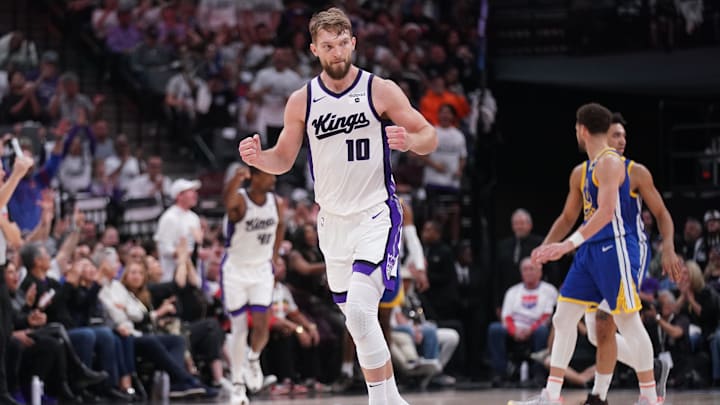 Apr 16, 2024; Sacramento, California, USA; Sacramento Kings forward Domantas Sabonis (10) reacts after the Kings made a basket against the Golden State Warriors in the second quarter during a play-in game of the 2024 NBA playoffs at the Golden 1 Center. Mandatory Credit: Cary Edmondson-Imagn Images