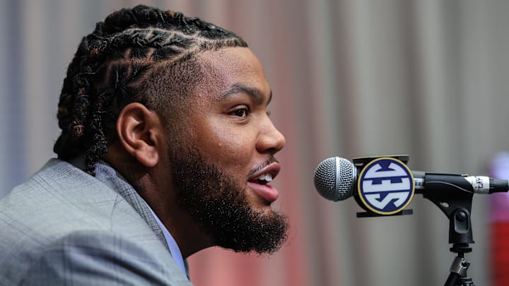 Arkansas Razorbacks defensive lineman Cam Ball answers questions from the media during SEC Media Days at Omni Atlanta Hotel.