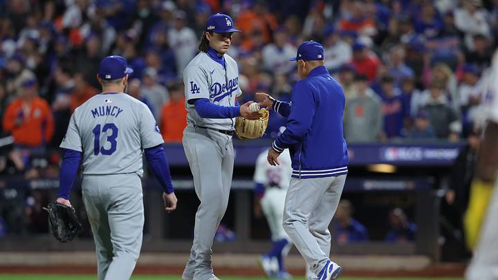 Oct 18, 2024; New York City, New York, USA; Los Angeles Dodgers relief pitcher Brent Honeywell (40) hands off the ball to manager Dave Roberts (30) in the eighth inning an during game five of the NLCS for the 2024 MLB playoffs at Citi Field. Mandatory Credit: Brad Penner-Imagn Images Oct 18, 2024; New York City, New York, USA; Los Angeles Dodgers relief pitcher Brent Honeywell (40) hands off the ball to manager Dave Roberts (30) in the eighth inning an during game five of the NLCS for the 2024 MLB playoffs at Citi Field. Mandatory Credit: Brad Penner-Imagn Images
