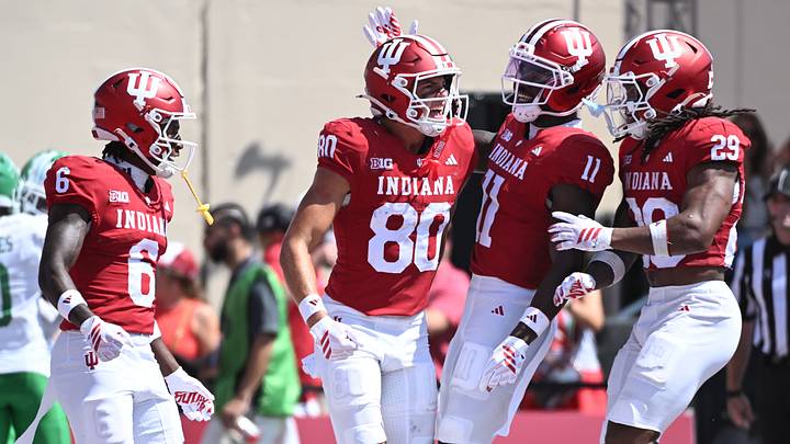 Sep 5, 2026; Bloomington, Indiana, USA; Indiana Hoosiers wide receiver Charlie Becker (80) reacts with wide receiver Nick Marsh (11), wide receiver LeBron Bond (6) and running back Lee Beebe Jr. (29) after catching a touchdown pass against the North Texas Mean Green during the third quarter at Merchants Bank Field at Memorial Stadium. Mandatory Credit: Robert Goddin-Imagn Images Sep 5, 2026; Bloomington, Indiana, USA; Indiana Hoosiers wide receiver Charlie Becker (80) reacts with wide receiver Nick Marsh (11), wide receiver LeBron Bond (6) and running back Lee Beebe Jr. (29) after catching a touchdown pass against the North Texas Mean Green during the third quarter at Merchants Bank Field at Memorial Stadium. Mandatory Credit: Robert Goddin-Imagn Images