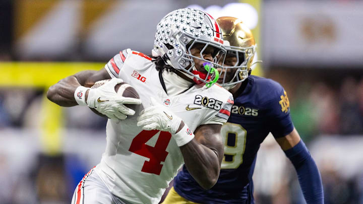 Jan 20, 2025; Atlanta, GA, USA; Ohio State Buckeyes wide receiver Jeremiah Smith (4) against the Notre Dame Fighting Irish during the CFP National Championship college football game at Mercedes-Benz Stadium. Mandatory Credit: Mark J. Rebilas-Imagn Images