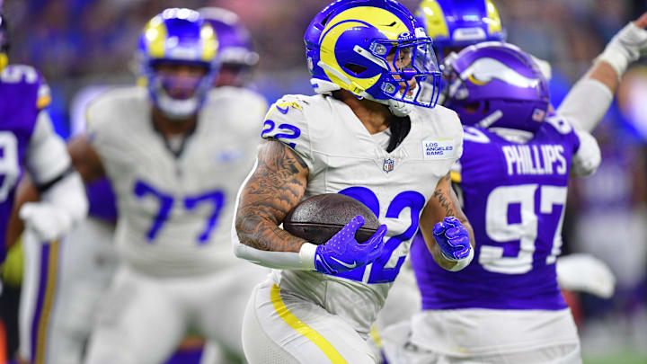 Oct 24, 2024; Inglewood, California, USA; Los Angeles Rams running back Blake Corum (22) runs the ball against the Minnesota Vikings during the first half at SoFi Stadium. Mandatory Credit: Gary A. Vasquez-Imagn Images