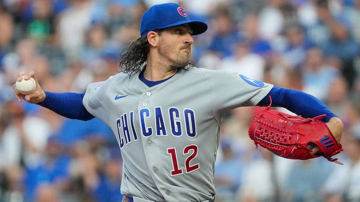 Aug 7, 2026; Kansas City, Missouri, USA; Chicago Cubs starting pitcher Kevin Gausman (12) delivers a pitch against the Kansas City Royals during the first inning at Kauffman Stadium. Mandatory Credit: Denny Medley-Imagn Images