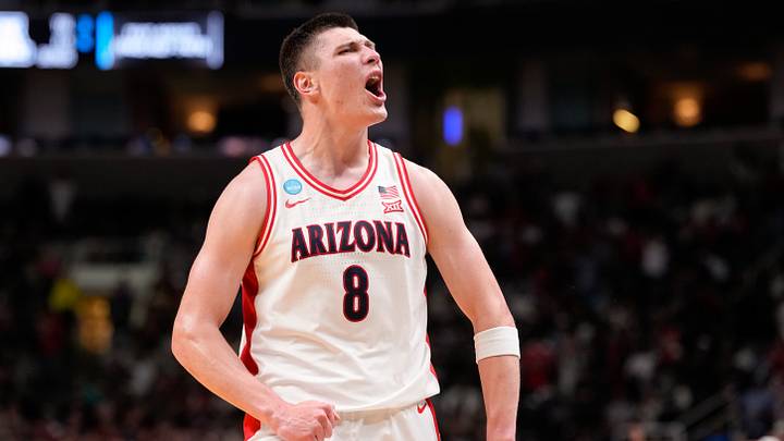 Mar 28, 2026; San Jose, CA, USA; Arizona Wildcats forward Ivan Kharchenkov (8) celebrates in the second half against the Purdue Boilermakers during an Elite Eight game of the West Regional of the men's 2026 NCAA Tournament at SAP Center. Mar 28, 2026; San Jose, CA, USA; Arizona Wildcats forward Ivan Kharchenkov (8) celebrates in the second half against the Purdue Boilermakers during an Elite Eight game of the West Regional of the men's 2026 NCAA Tournament at SAP Center.
