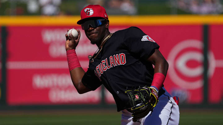 Mar 2, 2024; Goodyear, Arizona, USA; Cleveland Guardians second baseman Angel Martinez (79) throws to first against the Kansas City Royals during the second inning at Goodyear Ballpark. Mandatory Credit: Joe Camporeale-Imagn Images