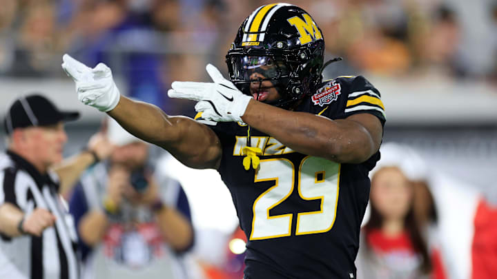 Missouri Tigers running back Ahmad Hardy (29) reacts to his first down pickup during the first quarter of the TaxSlayer Gator Bowl at EverBank Stadium, Saturday, Dec. 27, 2025, in Jacksonville. Fla. [Corey Perrine/Florida Times-Union]