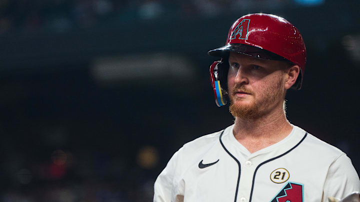 Sep 15, 2024; Phoenix, Arizona, USA; Arizona Diamondbacks outfielder Pavin Smith (26) prepares for his at bat in the fifth inning for a game against the Milwaukee Brewers at Chase Field. Mandatory Credit: Allan Henry-Imagn Images