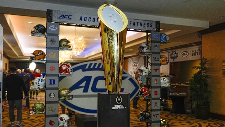 Jul 22, 2024; Charlotte, NC, USA; The CFP National Championship trophy is seen during the ACC Kickoff at Hilton Charlotte Uptown. Mandatory Credit: Jim Dedmon-Imagn Images Jul 22, 2024; Charlotte, NC, USA; The CFP National Championship trophy is seen during the ACC Kickoff at Hilton Charlotte Uptown. Mandatory Credit: Jim Dedmon-Imagn Images