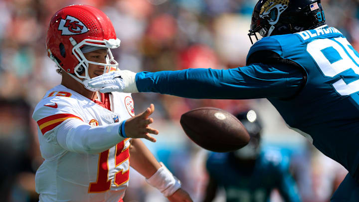 Kansas City Chiefs quarterback Patrick Mahomes (15) is pressured y Jacksonville Jaguars defensive