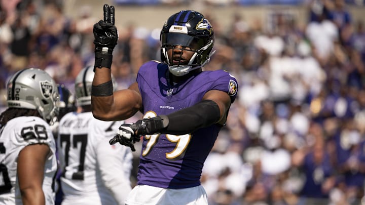 Baltimore Ravens linebacker Odafe Oweh celebrates after sacking Las Vegas Raiders quarterback Gardner Minshew.
