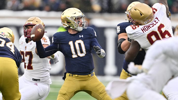Nov 19, 2022; South Bend, Indiana, USA; Notre Dame Fighting Irish quarterback Drew Pyne (10) throws in the second quarter against the Boston College Eagles at Notre Dame Stadium. 