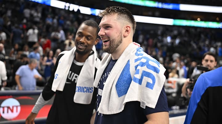 Oct 24, 2024; Dallas, Texas, USA; San Antonio Spurs forward Harrison Barnes (40) talks with Dallas Mavericks guard Luka Doncic (77) after the game at the American Airlines Center. Mandatory Credit: Jerome Miron-Imagn Images