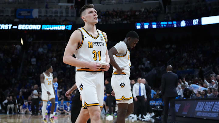 Mar 20, 2025; Wichita, KS, USA; Missouri Tigers guard Caleb Grill (31) reacts after losing to the Drake Bulldogs in a first round men’s NCAA Tournament game at Intrust Bank Arena. Mandatory Credit: Kirby Lee-Imagn Images Mar 20, 2025; Wichita, KS, USA; Missouri Tigers guard Caleb Grill (31) reacts after losing to the Drake Bulldogs in a first round men’s NCAA Tournament game at Intrust Bank Arena. Mandatory Credit: Kirby Lee-Imagn Images