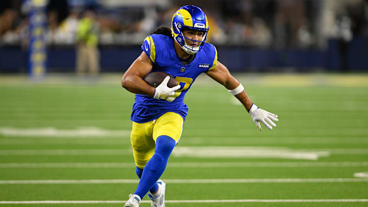 Nov 24, 2024; Inglewood, California, USA;  Los Angeles Rams wide receiver Puka Nacua (17) runs after making a catch against the Philadelphia Eagles during the second half at SoFi Stadium. Mandatory Credit: Alex Gallardo-Imagn Images