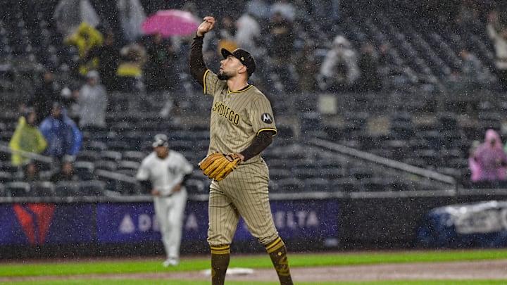 May 5, 2025; Bronx, New York, USA; San Diego Padres pitcher Robert Suarez (75) reacts after getting the final out against the New York Yankees at Yankee Stadium. Mandatory Credit: John Jones-Imagn Images
