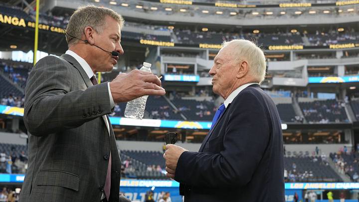 Dallas Cowboys owner Jerry Jones talks with Troy Aikman before a game against the Los Angeles Chargers at SoFi Stadium. Dallas Cowboys owner Jerry Jones talks with Troy Aikman before a game against the Los Angeles Chargers at SoFi Stadium.
