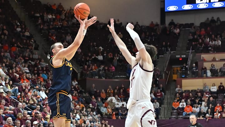 Jan 10, 2026; Blacksburg, Va.; California forward John Camden (2) shoots, defended by Virginia Tech guard Neoklis Avdalas (17).