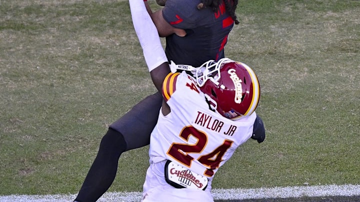 Nov 8, 2025; Fort Worth, Texas, USA; TCU Horned Frogs wide receiver Jordan Dwyer (7) catches a pass for a touchdown over Iowa State Cyclones defensive back Quentin Taylor (24) during the second half at Amon G. Carter Stadium. Mandatory Credit: Jerome Miron-Imagn Images Nov 8, 2025; Fort Worth, Texas, USA; TCU Horned Frogs wide receiver Jordan Dwyer (7) catches a pass for a touchdown over Iowa State Cyclones defensive back Quentin Taylor (24) during the second half at Amon G. Carter Stadium. Mandatory Credit: Jerome Miron-Imagn Images