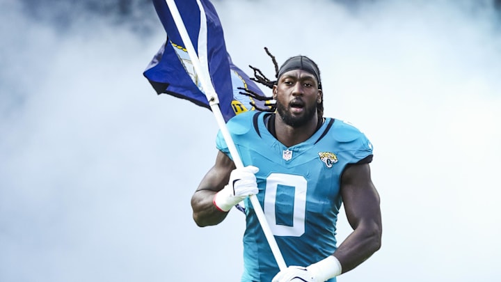 Jacksonville Jaguars linebacker Devin Lloyd (0) participates in pregame player introductions