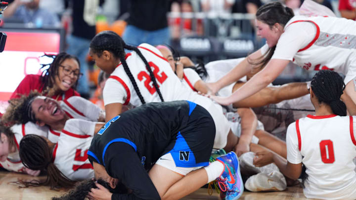 Carl Albert celebrates as Newcastle's Amara King (5) reacts during the Class 4A girls state high school championship basketball game between Carl Albert and Newcastle at OG&E Coliseum Oklahoma City, Okla., Saturday March 14, 2026. Carl Albert celebrates as Newcastle's Amara King (5) reacts during the Class 4A girls state high school championship basketball game between Carl Albert and Newcastle at OG&E Coliseum Oklahoma City, Okla., Saturday March 14, 2026.